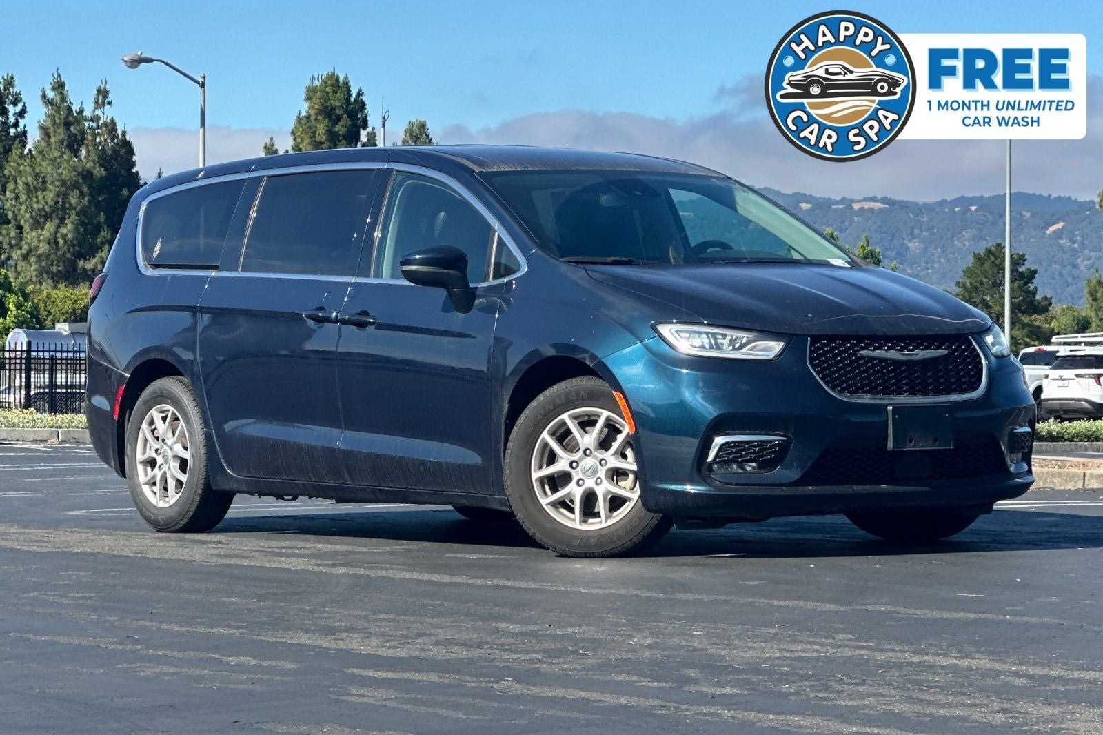 2023 Chrysler Pacifica Touring L in Fathom Blue Pearlcoat — front three-quarter view