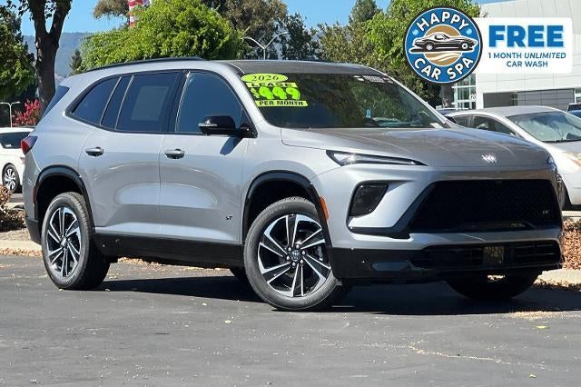 2026 Buick Enclave Sport Touring in Moonstone Gray Metallic — front three-quarter view